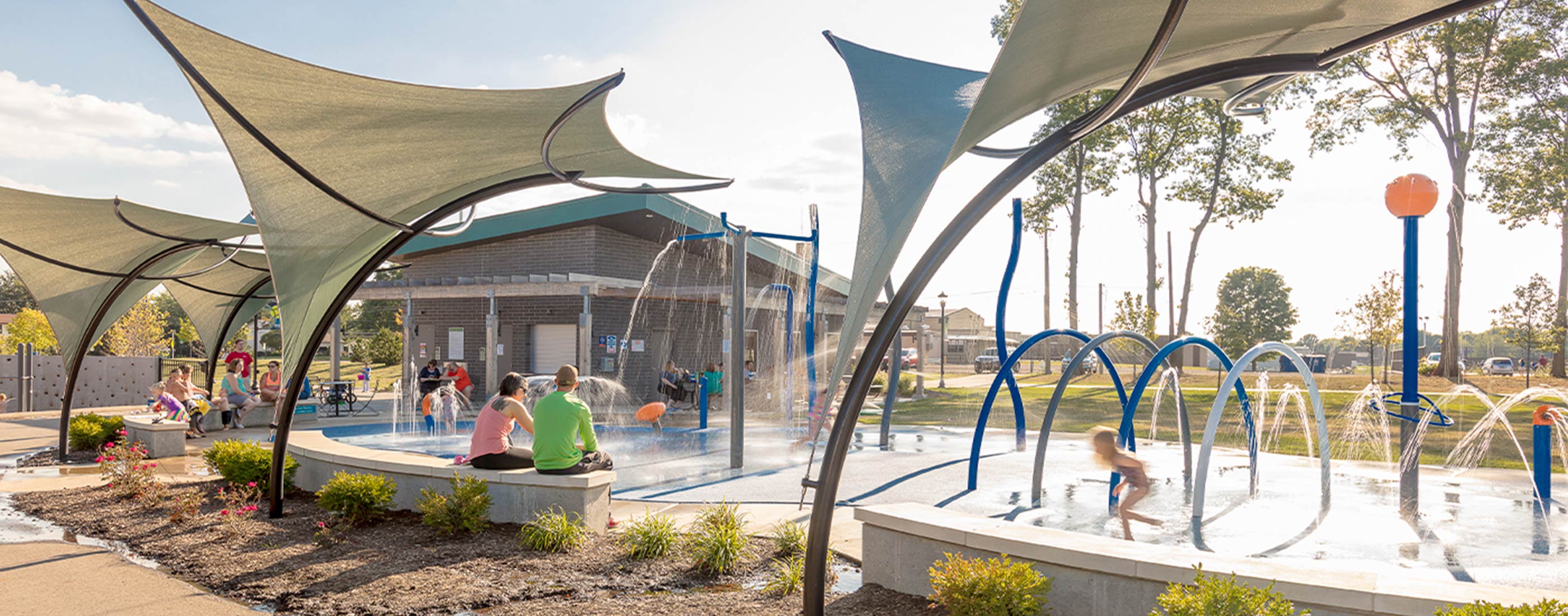 The City of Green Central Park includes a splash pad with multiple play zones.