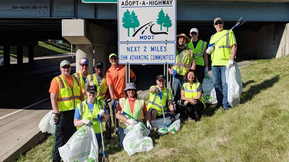 A team of OHM Advisors employees volunteer with Adopt-A-Highway.