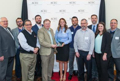 OHM Advisors’ employees accept the ACEC of Ohio Arcadis Award recognizing Downtown Newark, Ohio.