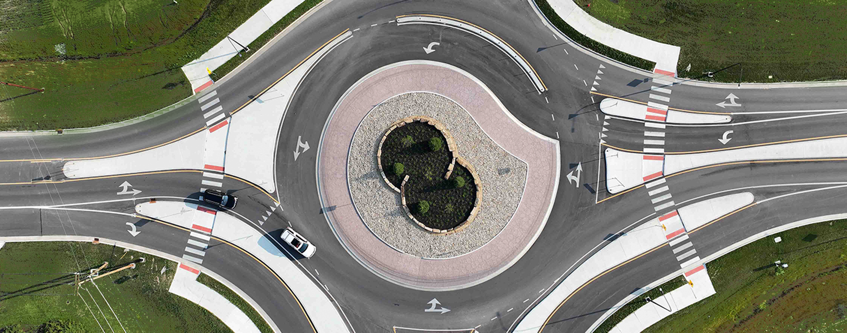 Birds-eye view of traffic flowing within the roundabout at Home Road and Lewis Center Rd in Delaware, Ohio