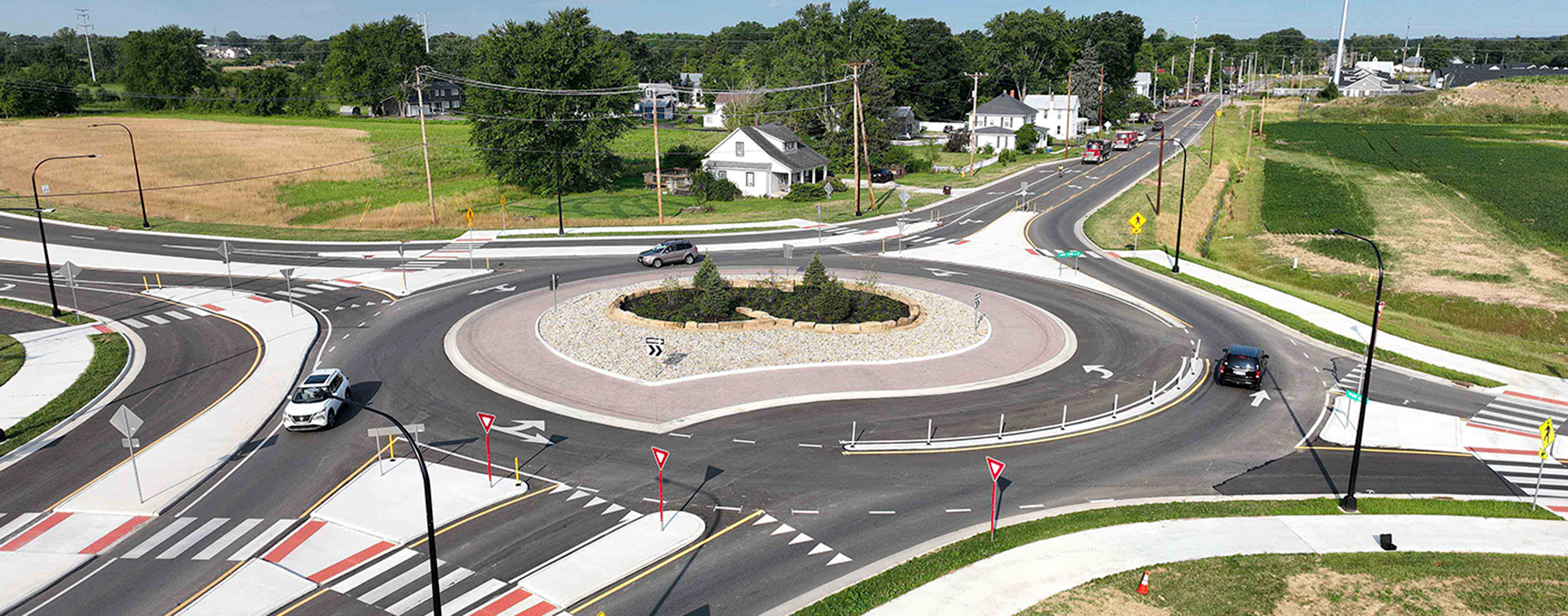 Birds-eye view of traffic flowing within the roundabout at Home Road and Lewis Center Rd in Delaware, Ohio