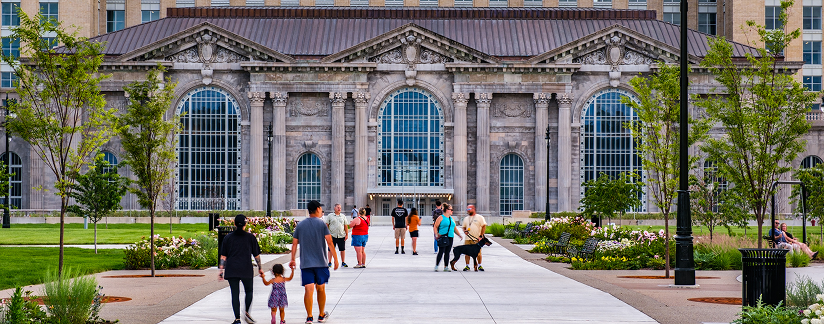 A wide pedestrian oriented promenade connects Roosevelt Park to Michigan Central Station